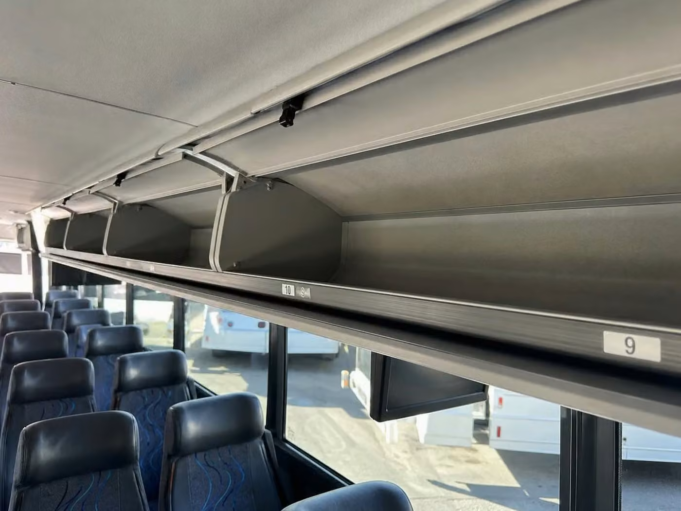 dunedin 18 passenger minibus overhead storage
