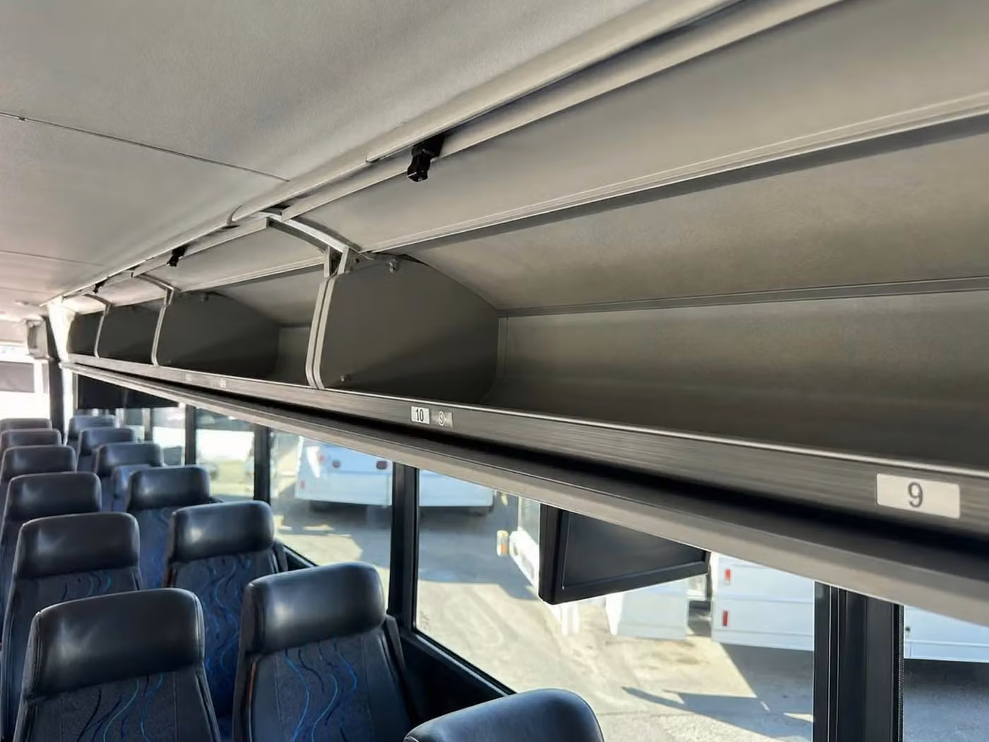 dunedin 25 passenger minibus overhead storage