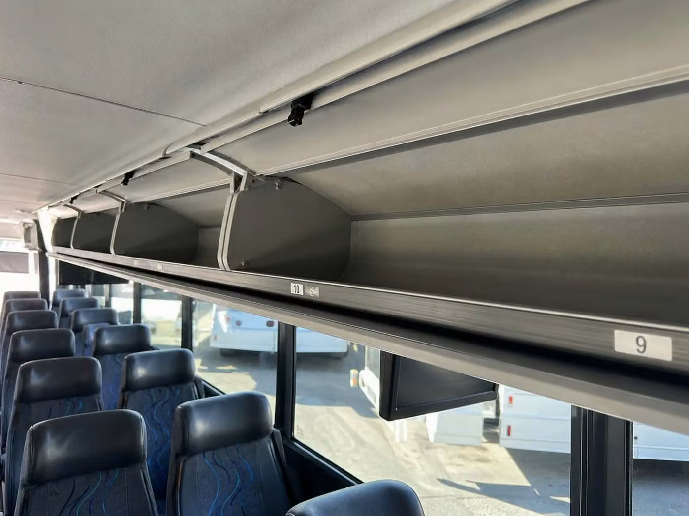 dunedin 35 passenger minibus overhead storage