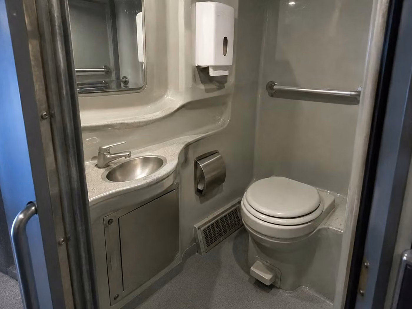 dunedin charter bus onboard restroom